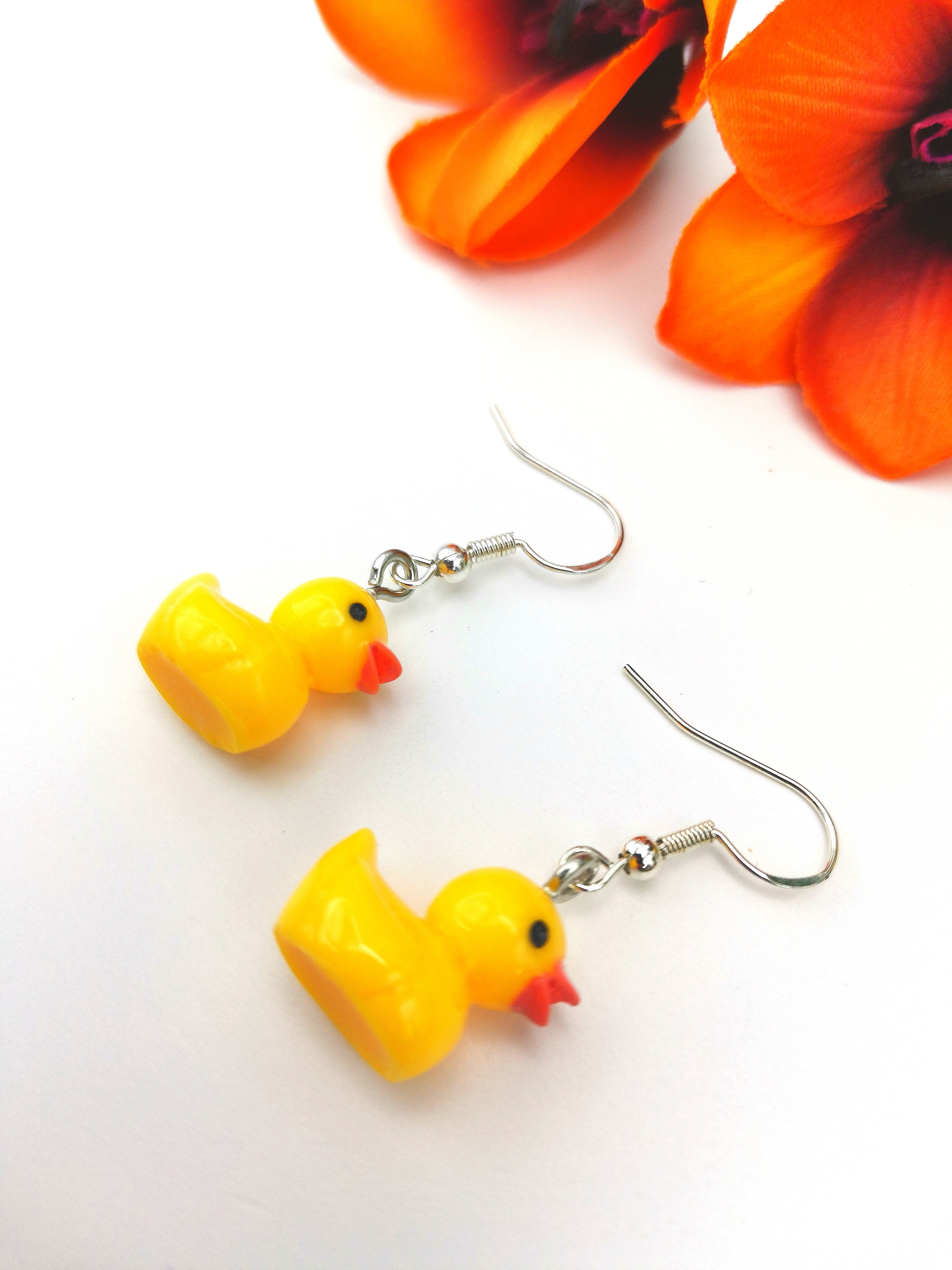 Add a playful touch to your outfit with Silver Sunbird&