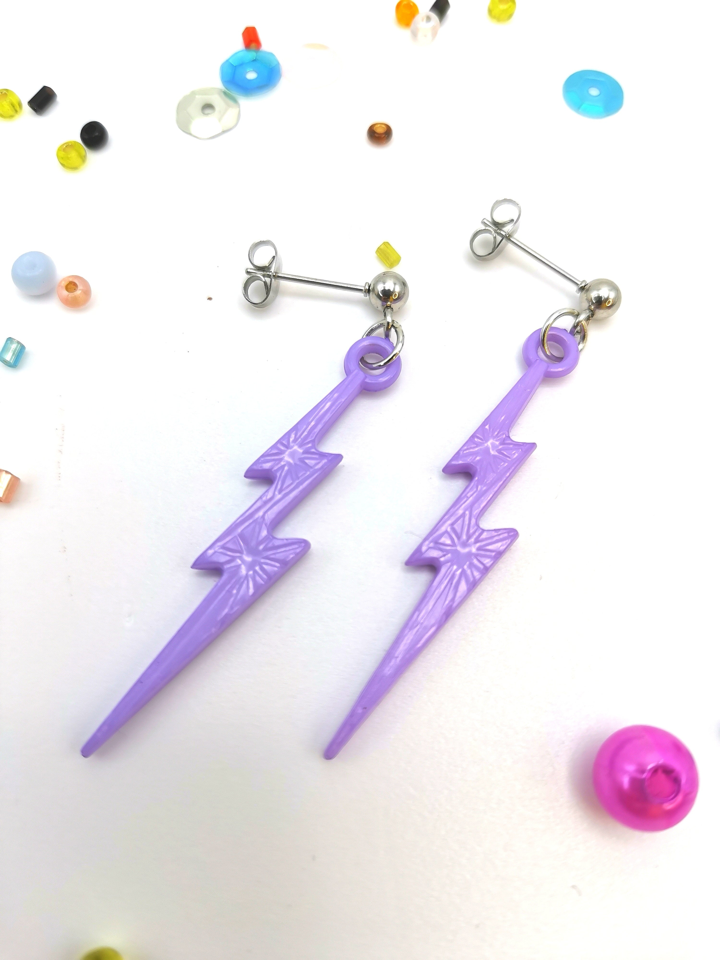 Two purple lightning bolt earrings from Silver Sunbird&