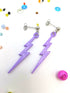 Two purple lightning bolt earrings from Silver Sunbird&