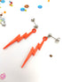 Two bright orange Electrifying Lightning Bolt Earrings from Silver Sunbird&