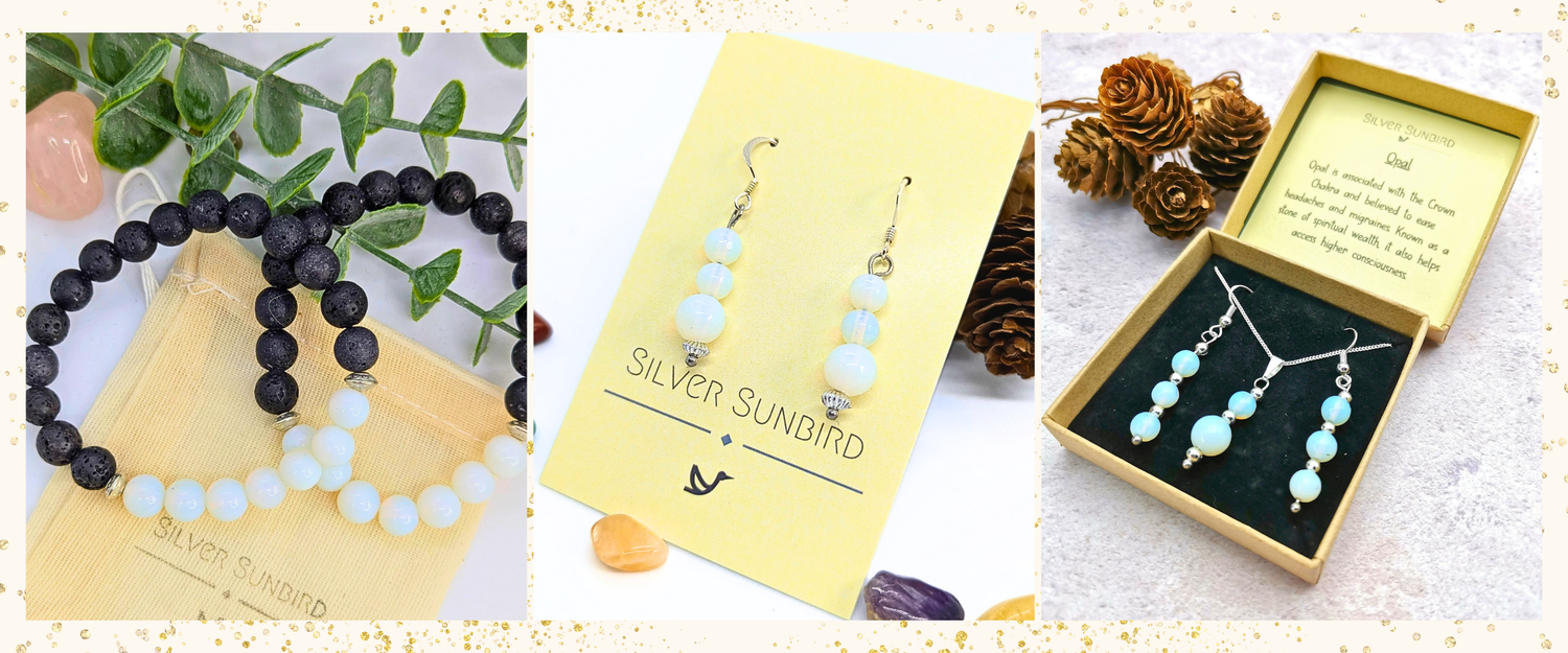 A selection of opal jewellery - bracelet, dangle earrings and a jewellery gift set.