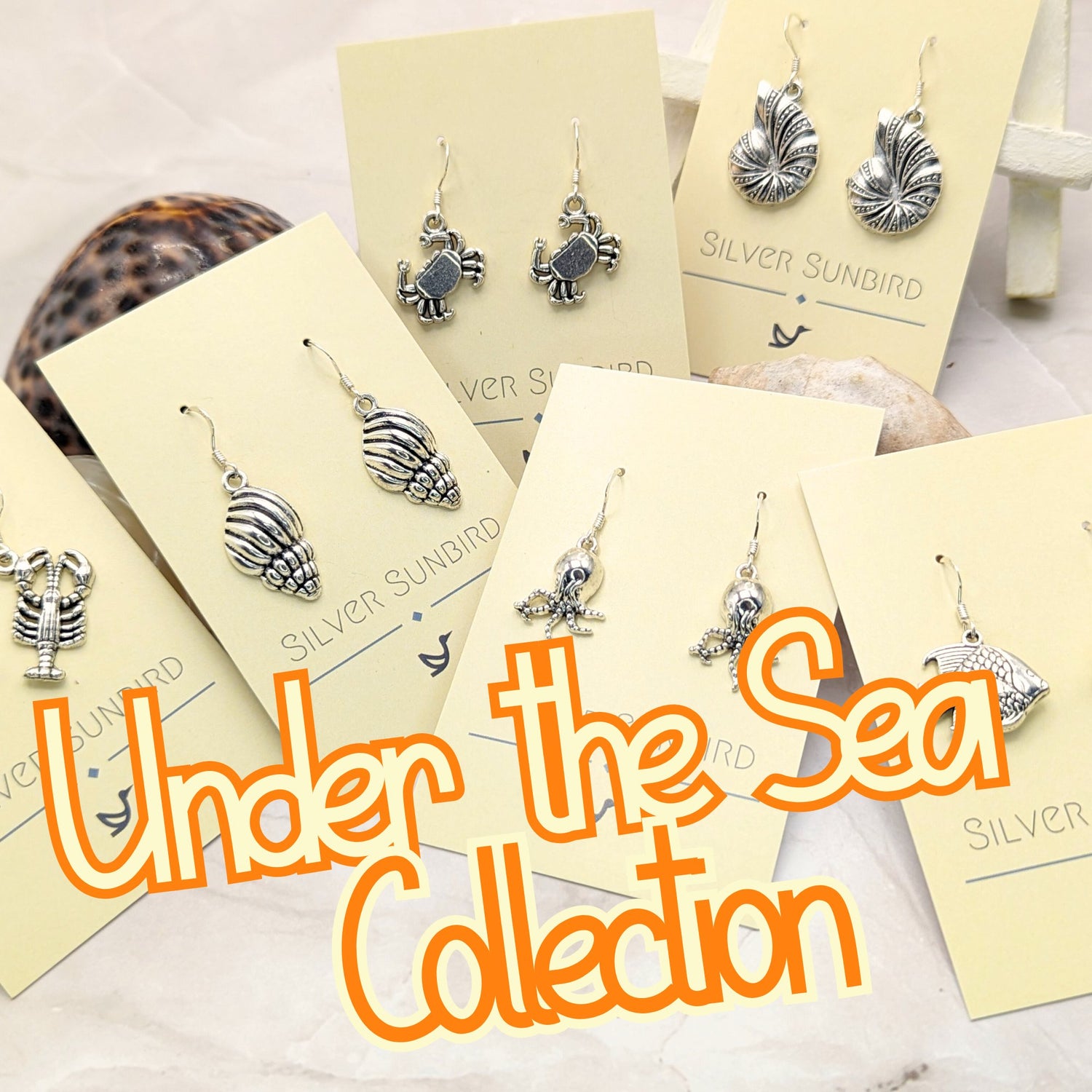 Under the sea earring collection including lobsters, crabs, octopus and more.