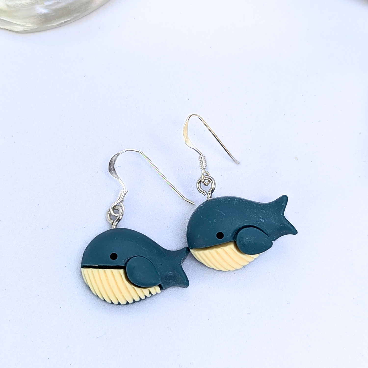 Add a playful touch to your look with Silver Sunbird&