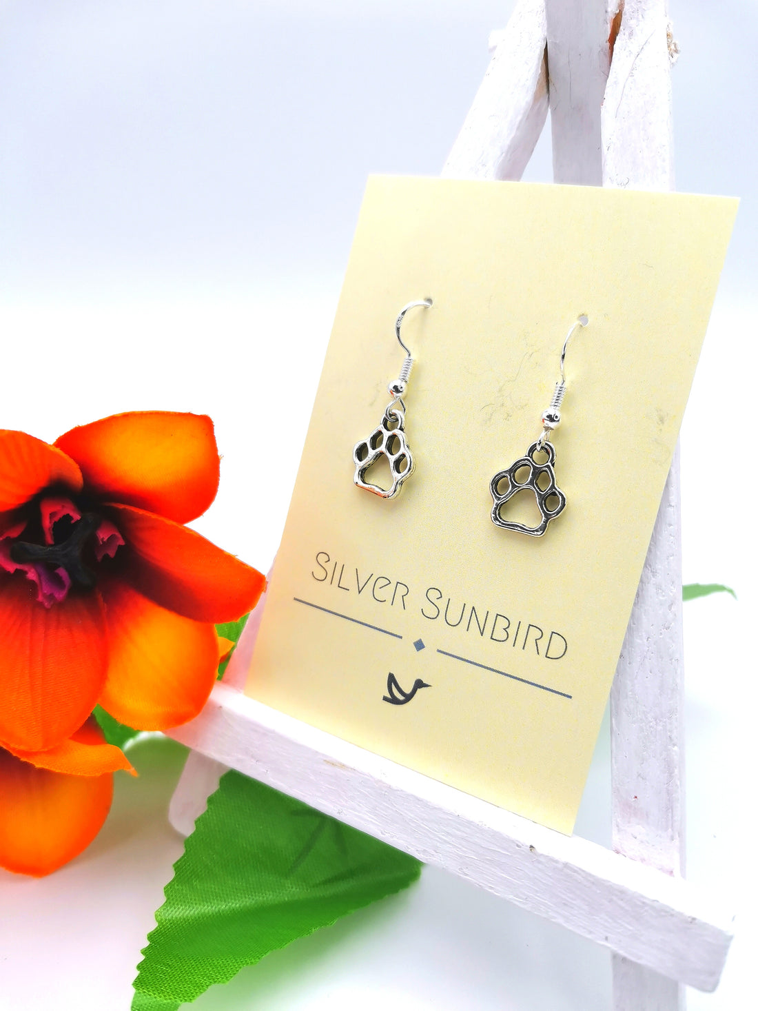 Faithful Friend Paw Print Earrings - Silver Sunbird animal earrings